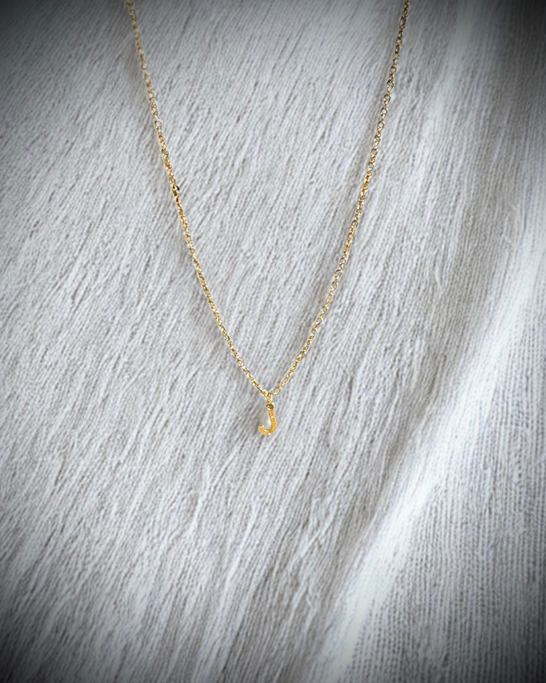 The initial necklace